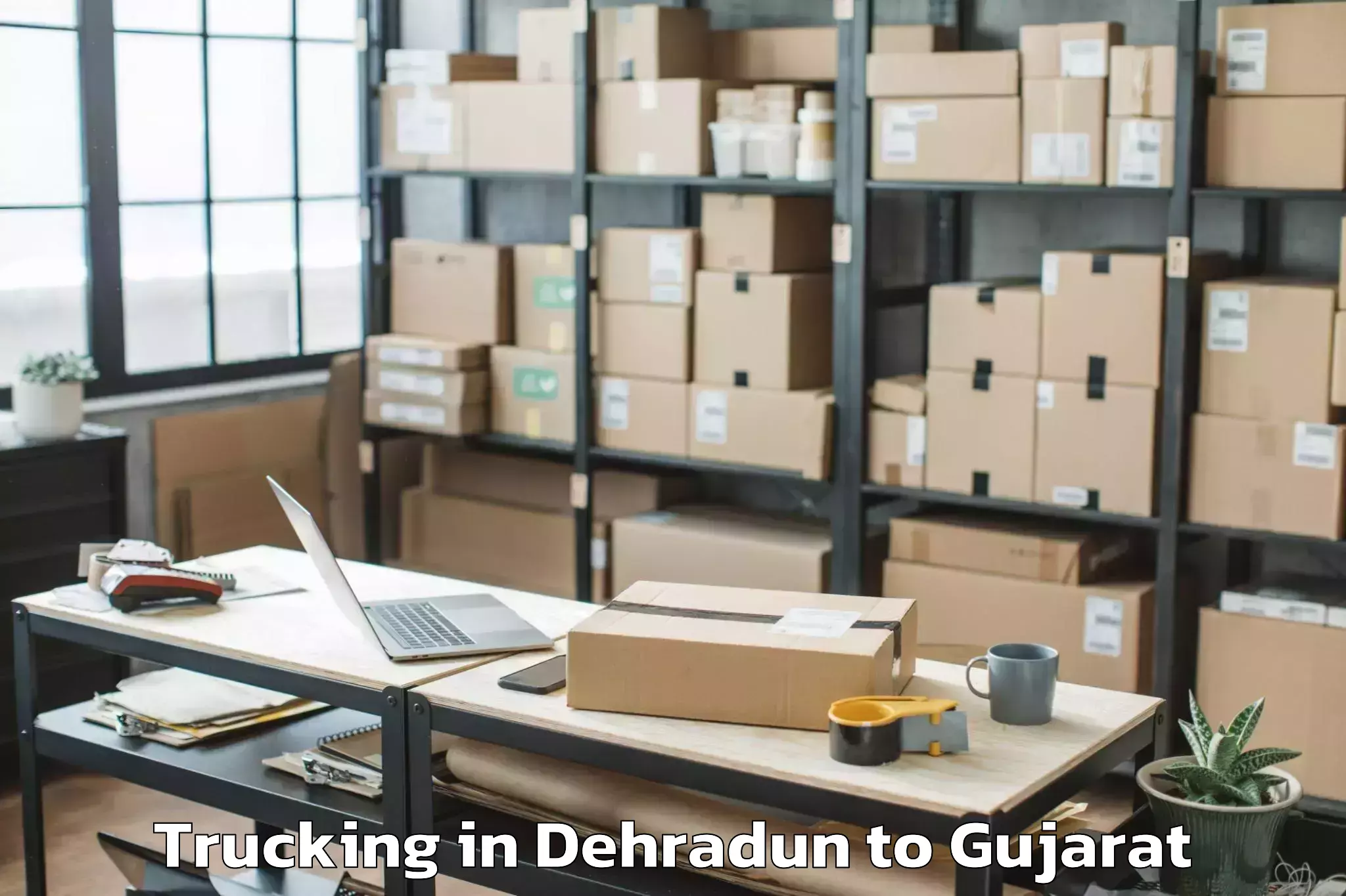 Book Dehradun to Dahej Trucking